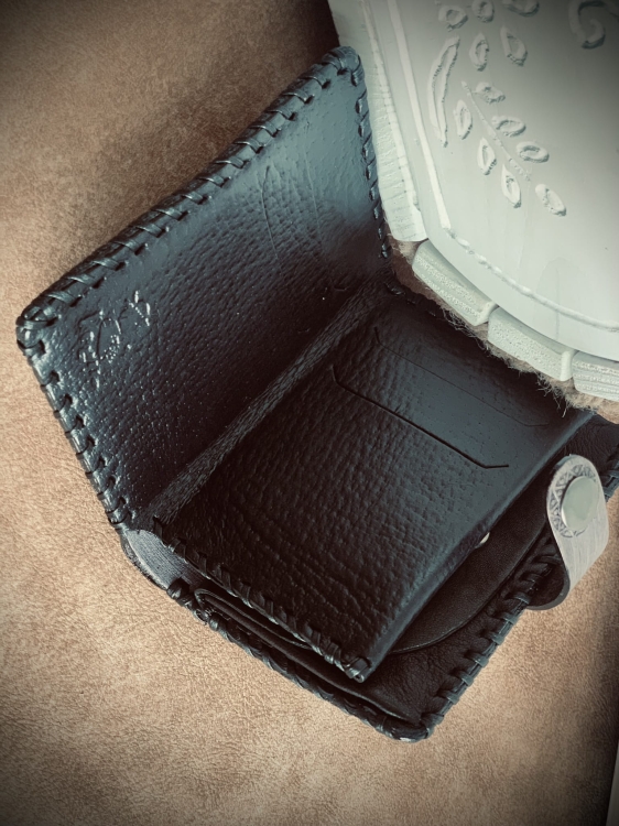 Męski skórzany portfel zdobiony rękodzieło